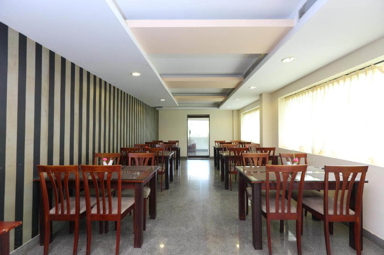 Oyo 15925 Tommaso Hotels And Resorts Sriperumbudur Buitenkant foto